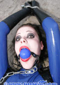 Fetish girl gaged with blue rubberbal. 