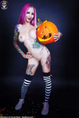 Brandy posing nude with pumpkin