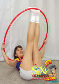 Sexy hula hoop girl plays with a huge vibrator on her pussy