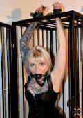 Marika caged and gagged