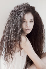 Pretty teensl with CURLY hair.